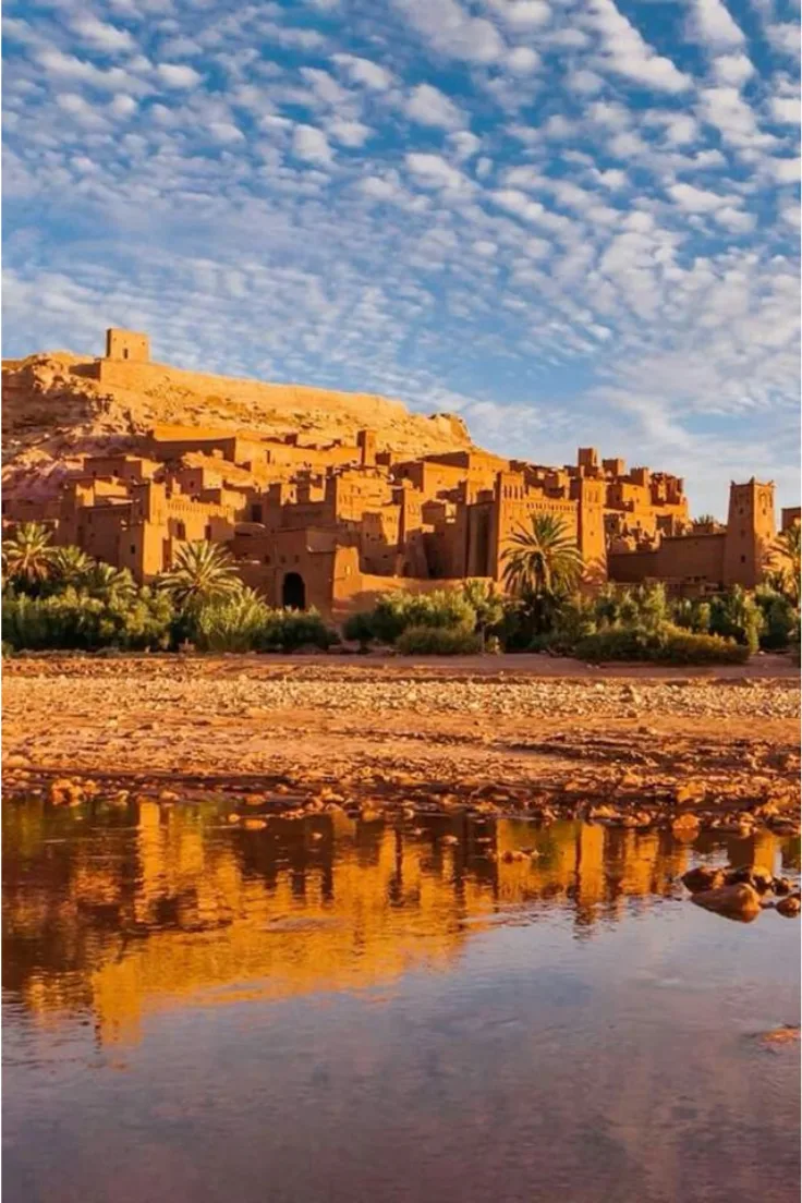 Ait Ben Haddou kasbah UNESCO World Heritage Site Ait Ben Haddou kasbah, UNESCO World Heritage Site, with palm trees near Ouarzazate