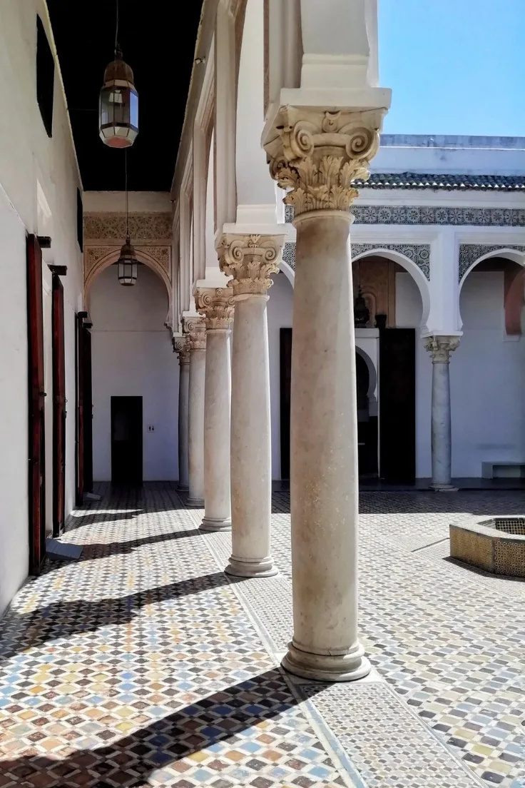 Arcade with stone columns and arches in a historic building in Tangier