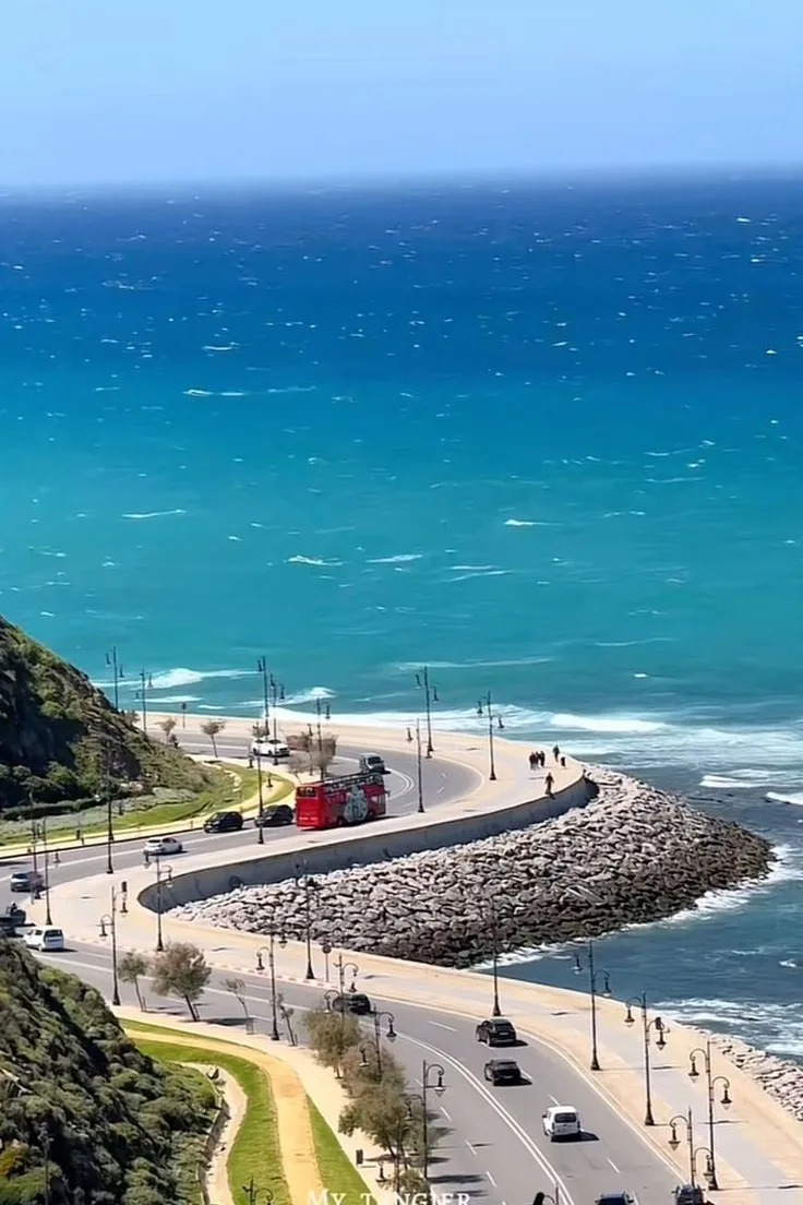 Turquoise Atlantic water and sandy beach along the Tangier coast