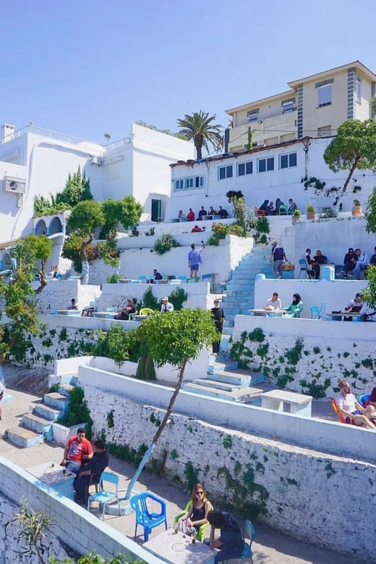 Whitewashed terraces of Cafe Hafa overlooking the sea in Tangier